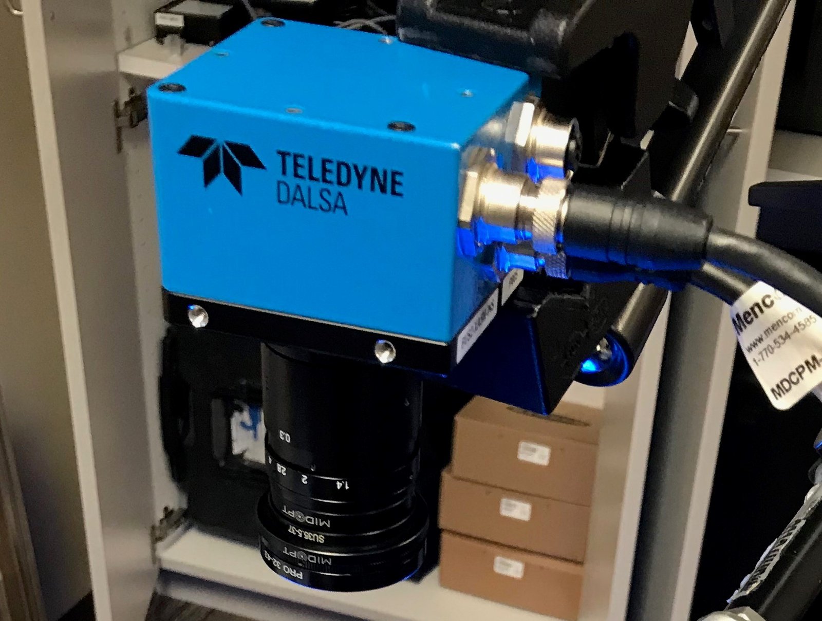 Integrated robotic vision system with camera, robot, and PLC